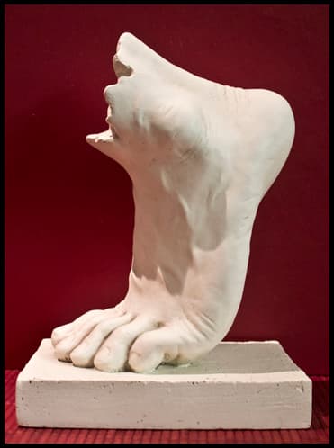 Foot sculpture representing patient education resources for podiatry care.