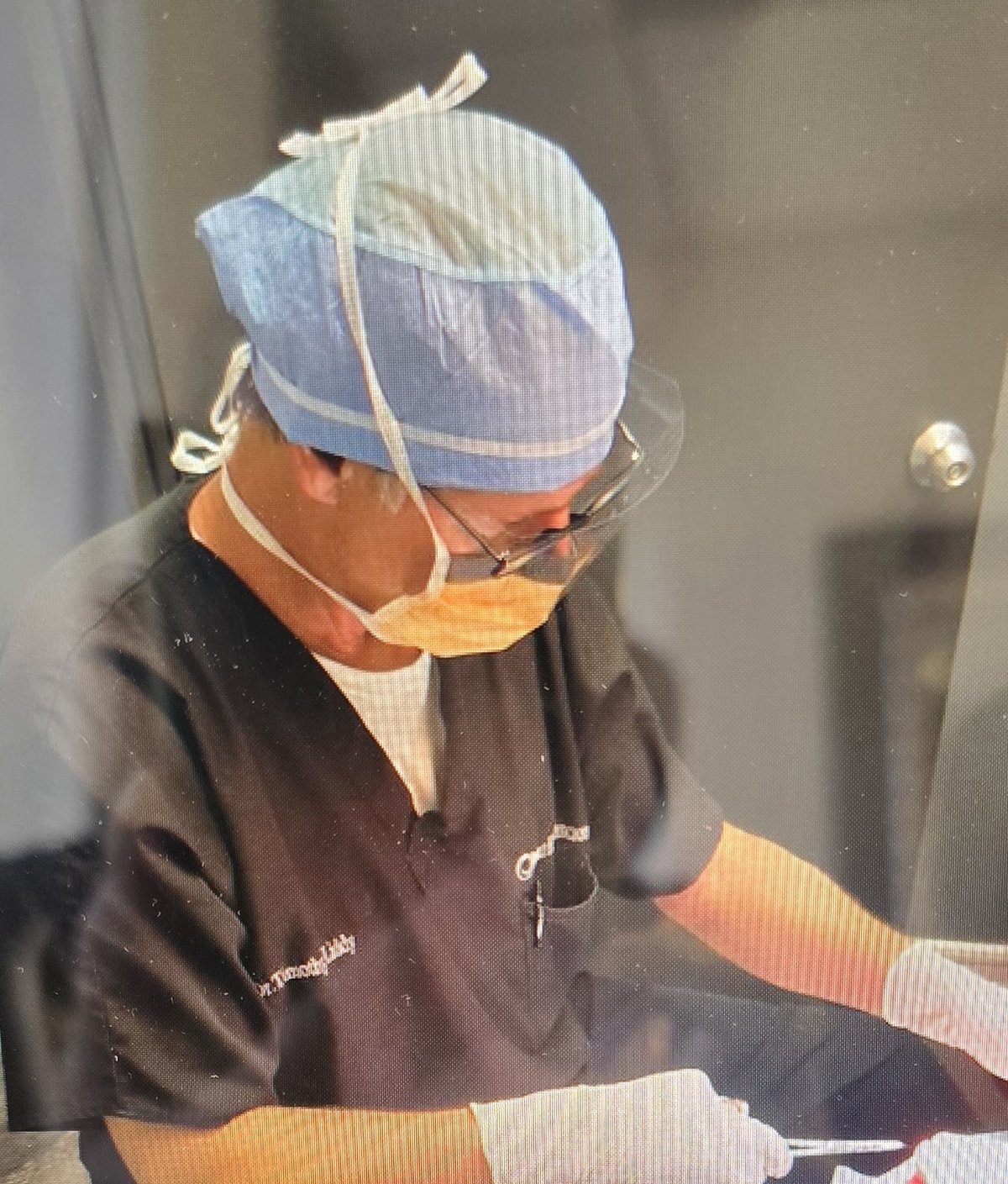 Dr. Timothy Liddy performing foot and ankle surgery in the operating room