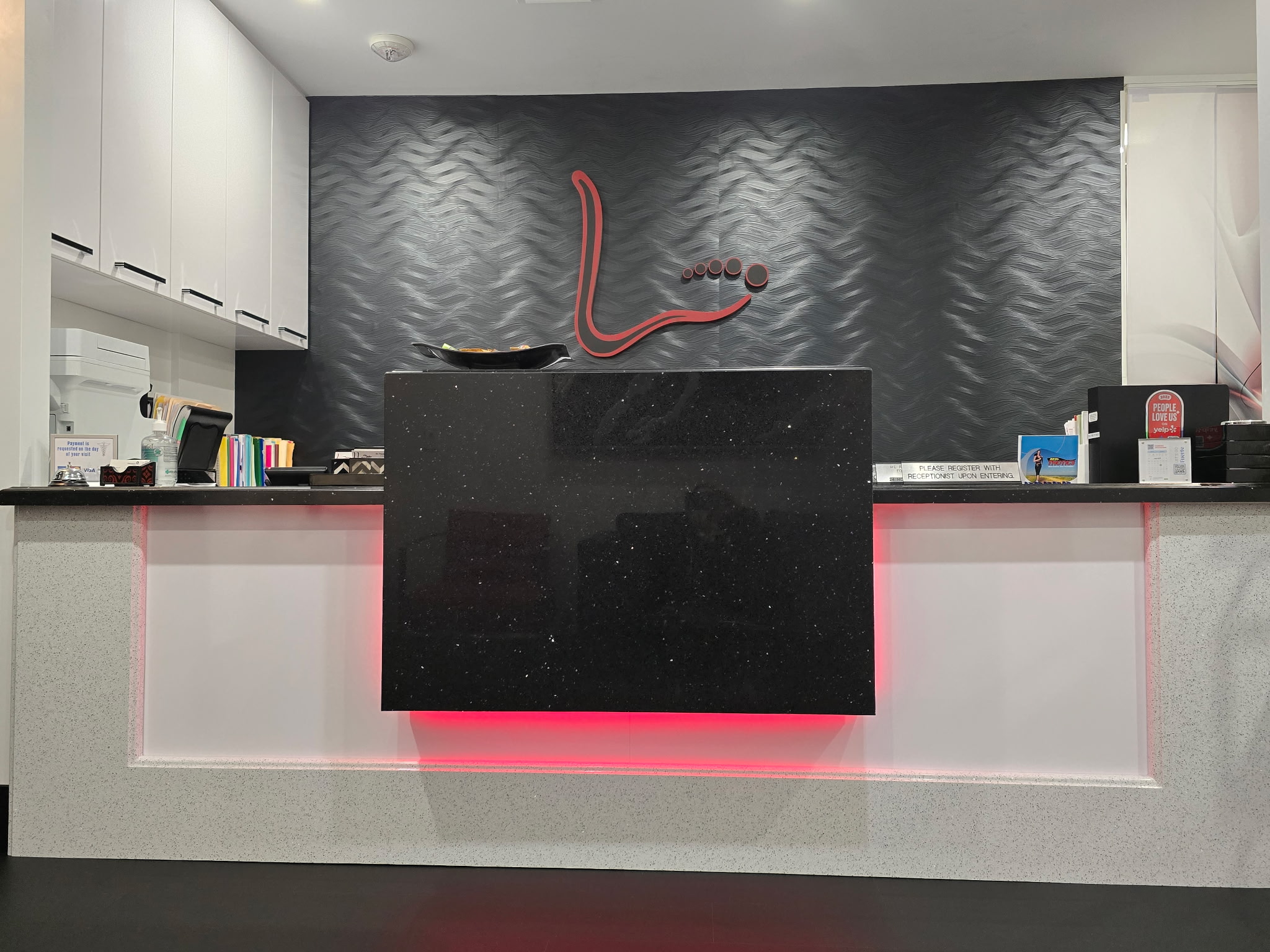 Wide view of the Liddy Podiatry reception area in Beverly Hills