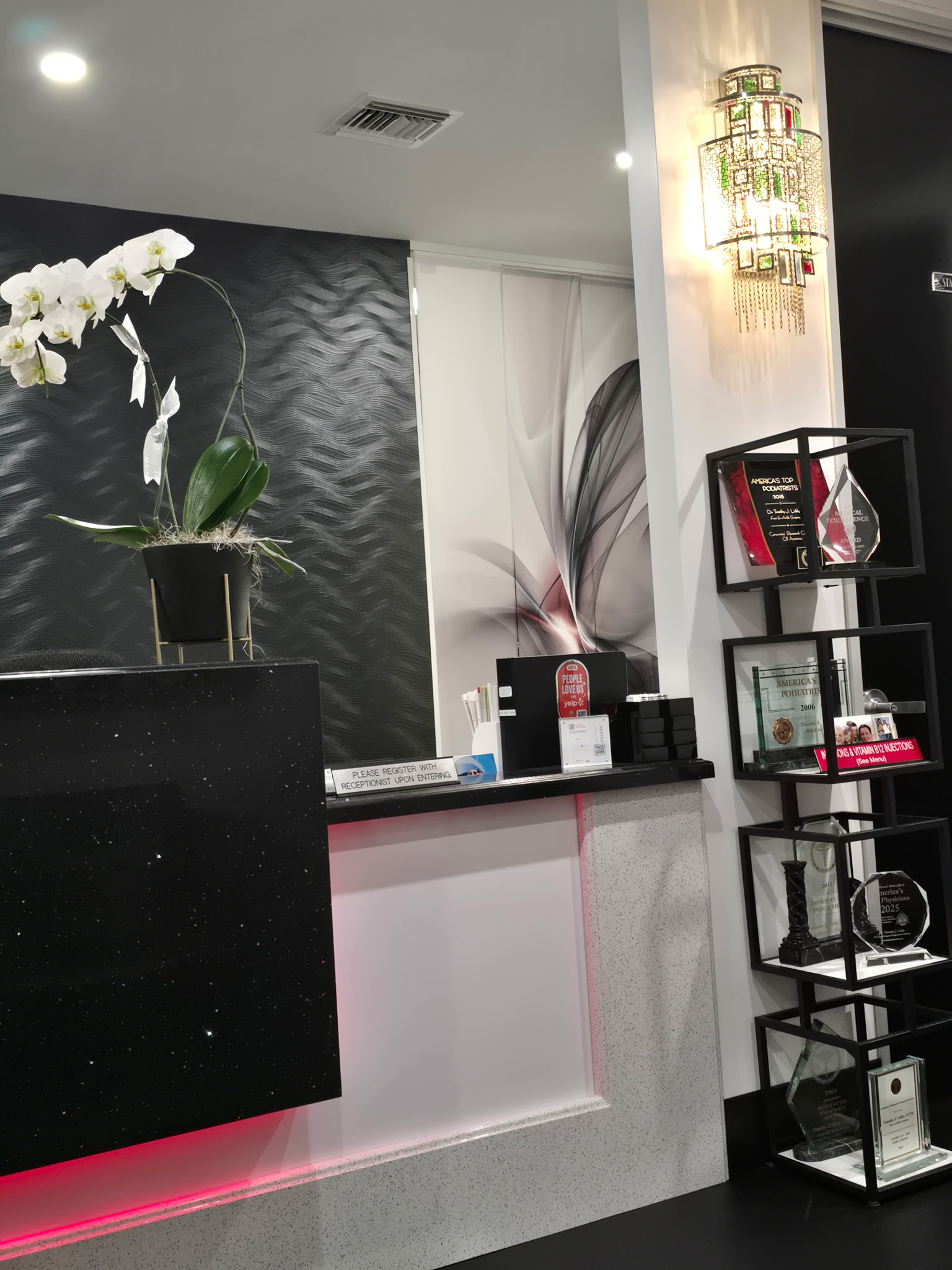 Reception with awards shelf inside the Liddy Podiatry office
