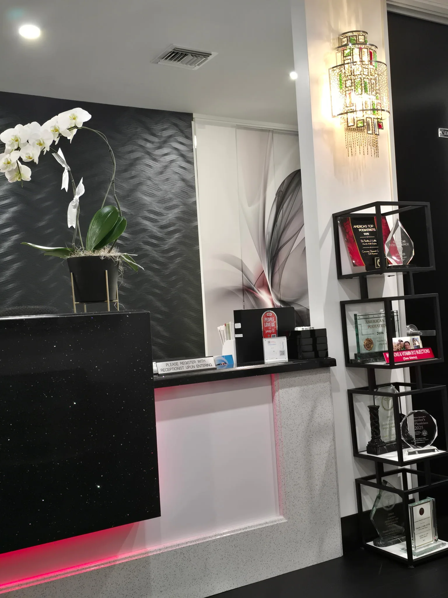 Reception with awards shelf inside the Liddy Podiatry office