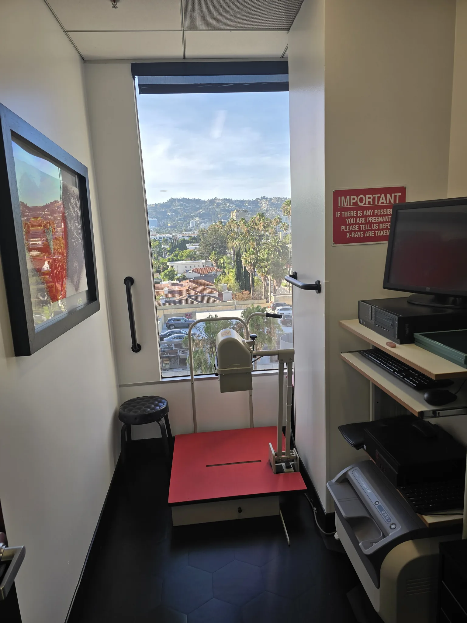 Treatment room with a window overlooking the hills